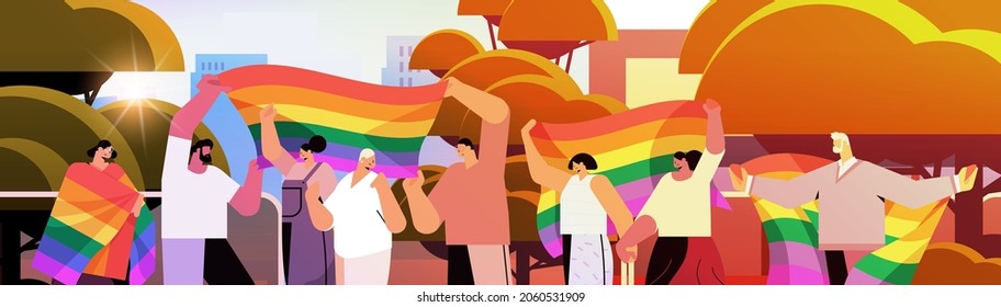 mix race people holding lgbt rainbow flags gay lesbian love parade pride festival transgender love concept