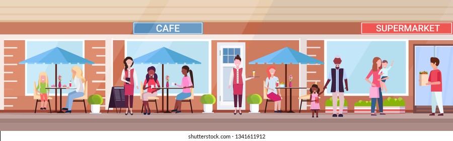 mix race people visitors sitting summer cafe shop customers holding purchases in front of supermarket exterior urban street concept horizontal banner full length