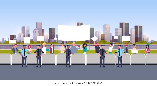 mix race police officers group controlling people crowd with placards and megaphone at protest demonstration strike concept city street cityscape background flat horizontal full length