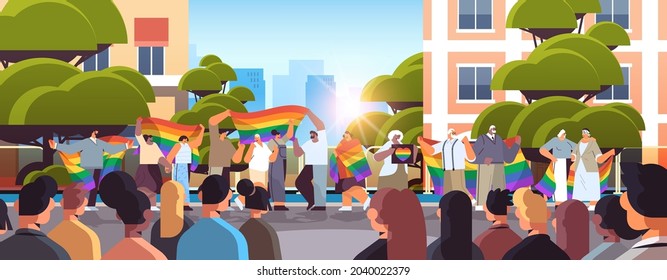 mix race senior people group holding lgbt rainbow flag gay lesbian love parade pride festival transgender love concept