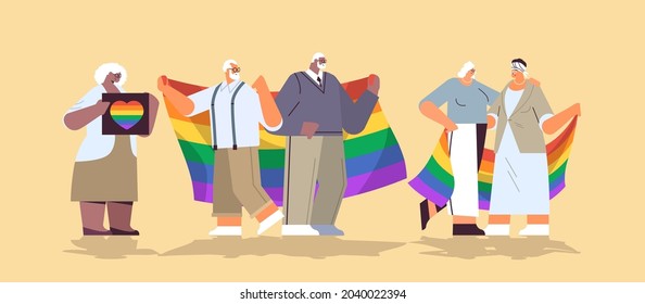 mix race senior people group holding lgbt rainbow flag gay lesbian love parade pride festival transgender love concept