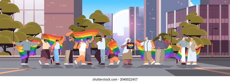 mix race senior people group holding lgbt rainbow flag gay lesbian love parade pride festival transgender love concept