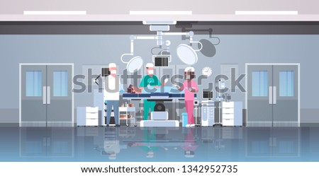 mix race surgeons team surrounding patient lying on operation table during surgery medical workers in operation room modern hospital clinic interior horizontal full length
