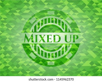 Mixed up green emblem. Mosaic background