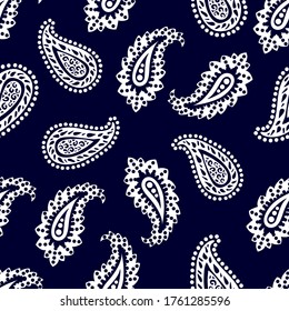 Mixed pattern with paisley elements. Oriental print with stylized leaves. Man fashion textile collection. White on dark blue background. 