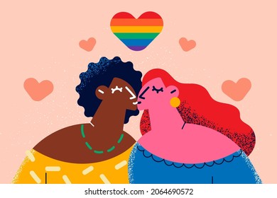 Mixed race lesbian love concept. Two young positive girls of different ethnics standing kissing with rainbow heart sign above vector illustration 