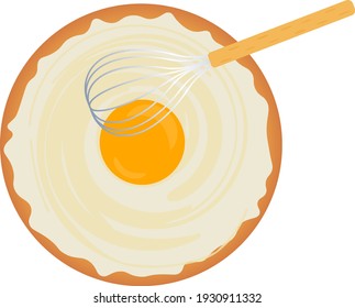 mixing dough with yolk and whisk 