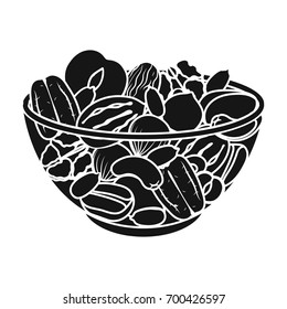 A mixture of different kinds of nuts. Different nuts single icon in black style vector symbol stock illustration web.