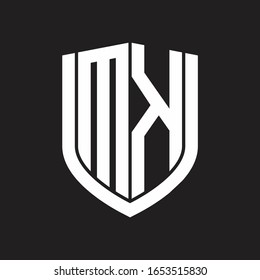Monograma del logotipo MK con diseño de escudo de emblemas aislado en fondo negro