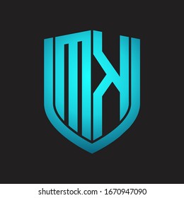 MK Logo monogram with emblem shield design isolated with blue colors on black background