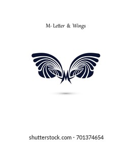 M-letter sign and angel wings.Monogram wing vector logo template.Classic emblem.Elegant dynamic alphabet letters with wings.Creative design element.Flat web design wings icon.Vector illustration.