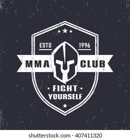 MMA club shield shape emblem, logo with spartan helmet, vector illustration