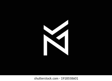 MN letter logo design on luxury background. NM monogram initials letter logo concept. MN icon design. NM elegant and Professional white color letter icon design on black background.