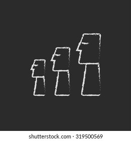Moai statues on Easter Island hand drawn in chalk on a blackboard vector white icon isolated on a black background.