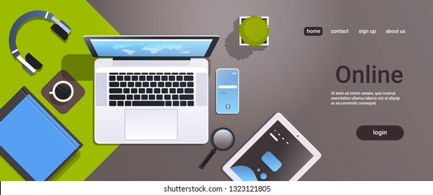 mobile computer app online top angle view workplace desktop with laptop tablet smartphone screen office stuff horizontal copy space
