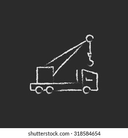 Mobile crane hand drawn in chalk on a blackboard vector white icon isolated on a black background.