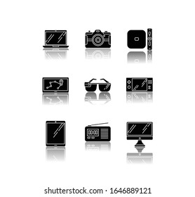 Mobile devices drop shadow black glyph icons set. Pocket electronic gadgets. Smart technology. Tablet, laptop, computer. Navigator, smartglasses, radio set. Isolated vector illustration on white space