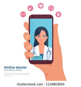 Mobile doctor illustration. Mobile medicine. Hand holding smartphone with young woman doctor on device screen. Video chat with medic. Flat design graphic concept. Vector eps 10.