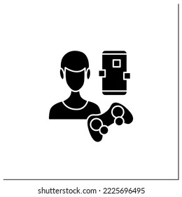 Mobile game glyph icon. Gaming on smartphones. Gamer playing with technical devices. Headphones, joystick. Esports concept. Filled flat sign. Isolated silhouette vector illustration