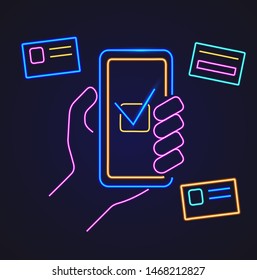 Mobile payments and online banking neon concept with hand holding smartphone and bank cards
