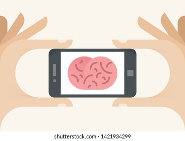 Mobile phone with brain on screen symbolizing modern digital center of technology (social networking, cloud computing, online games, shopping and entertainment, remote control etc.)