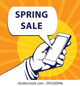 Mobile phone in businessman hand. Hand using smartphone, with a speech bubble, saying spring sale, vector illustration 
