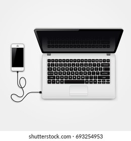 Mobile phone connected to laptop