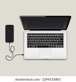 Teléfono móvil conectado al equipo portátil