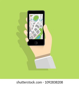 Mobile phone flat design and map application, hand holding concept., Technology evolution.