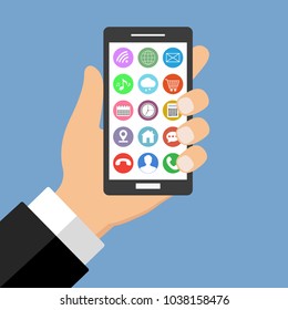 mobile phone in hand with attachments on a blue background