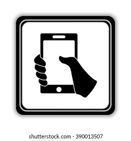 Mobile phone in hand  - black vector icon