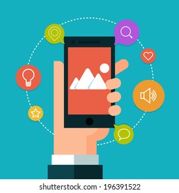 Mobile phone in hand. Flat style