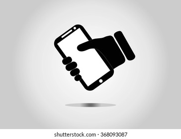 Mobile phone in hand icon