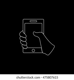 Mobile phone in hand  - white vector icon