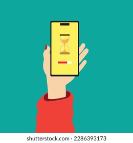 Mobile Phone Hourglass Countdown Clock in hand on green background.