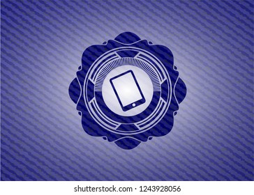 mobile phone icon inside badge with denim background