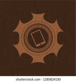 mobile phone icon inside badge with wood background