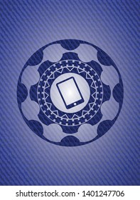 mobile phone icon inside badge with denim background