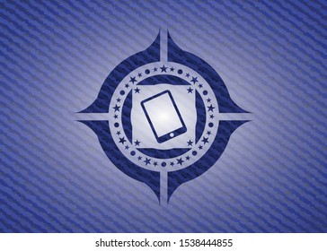 mobile phone icon inside badge with denim texture