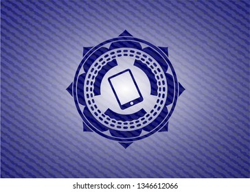 mobile phone icon inside emblem with jean high quality background