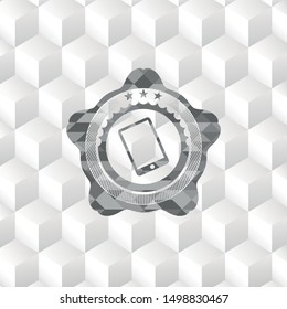 mobile phone icon inside grey badge with geometric cube white background