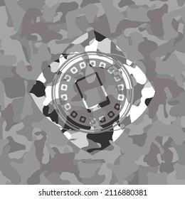 mobile phone icon inside grey camo emblem. 