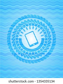 mobile phone icon inside light blue water style emblem.