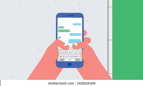 Mobile phone in the left hand of walking person on street. Message application is in the mobile phone screen.