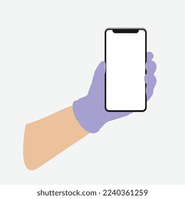 Mobile phone in a man's hand, hand in a medical, rubber glove, light skin