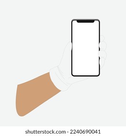 Mobile phone in a man's hand, hand in a medical, rubber glove, light skin