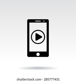 Mobile phone with play button sign icon, vector illustration. Flat design style
