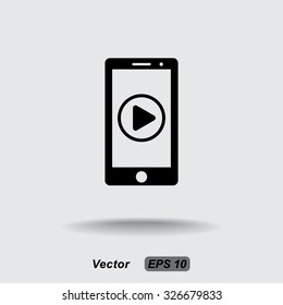 Mobile phone with play button sign icon, vector illustration. Flat design style