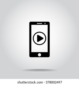 Mobile phone with play button sign icon, vector illustration. Flat design style