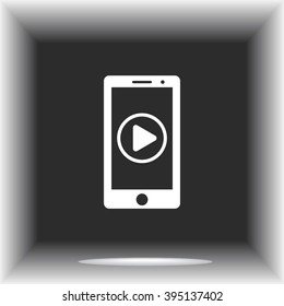 Mobile phone with play button sign icon, vector illustration. Flat design style